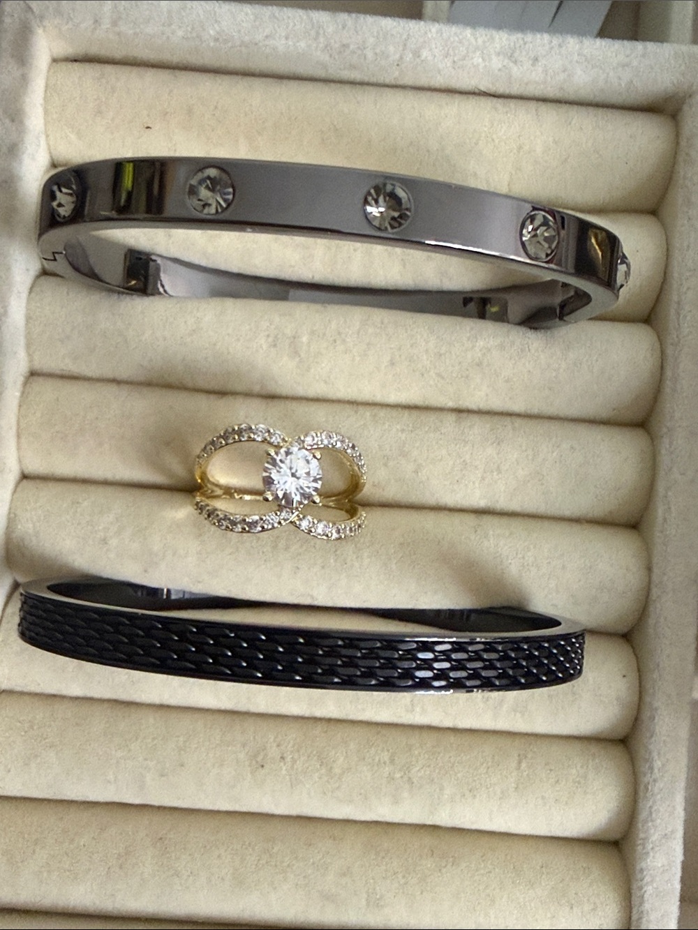 2 black bangles and gold size 9 ring for luv